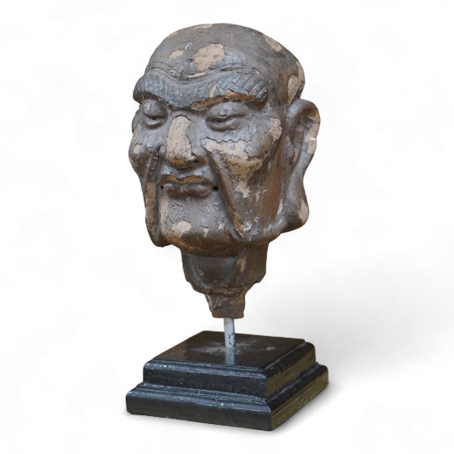A Chinese lacquered composition head of a Luohan, early Ming, 28cm including stand